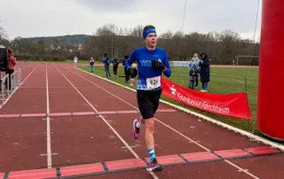 Julian mit einem starken Finish wodurch er wertvolle Punkte für die Mannschaftswertung des Laufteams Bayern sicherte.